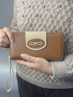 CrossKulture - DashingCarry lightweight long wallet front view in model hand