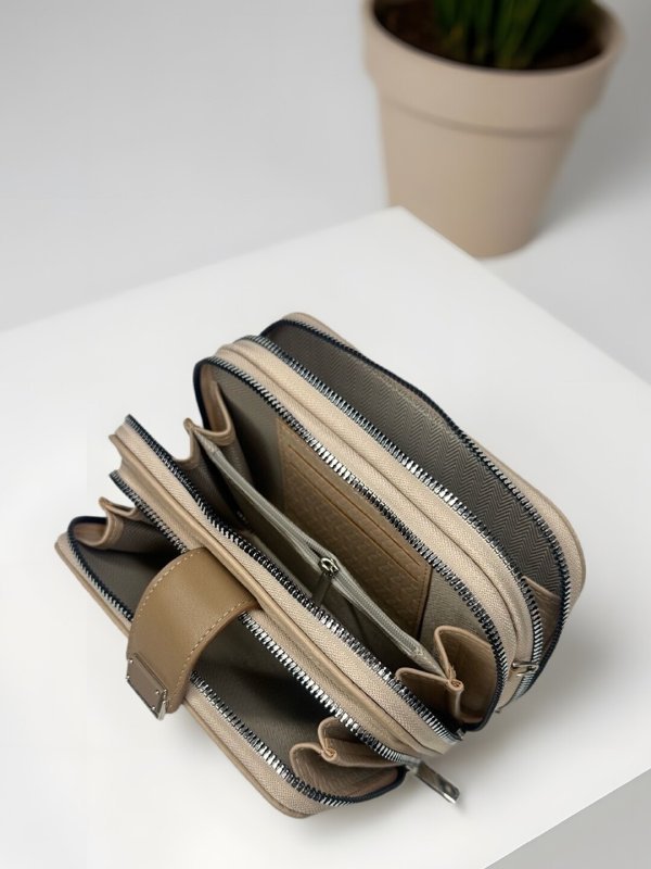 CrossKulture - UrbanSling lightweight sling interior view with zip compartment and storage pockets