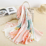 CrossKulture - GoldenAura Long Satin Scarf Golden placed on a bag view