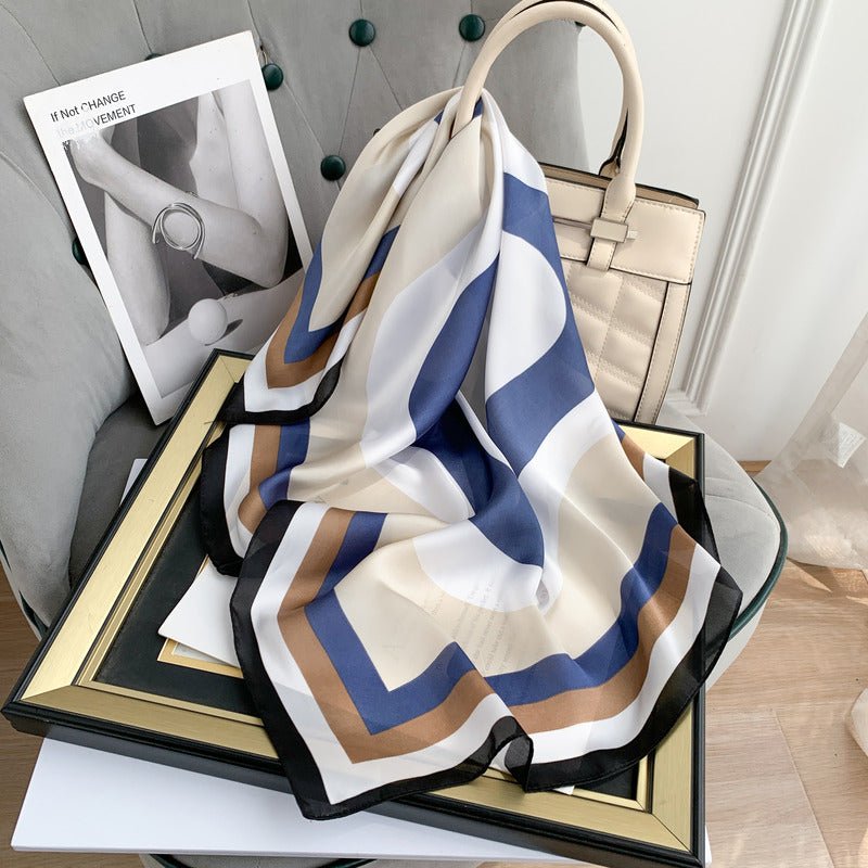 CrossKulture - Tides&Waves Small Square Satin Scarf Blue placed on a bag view