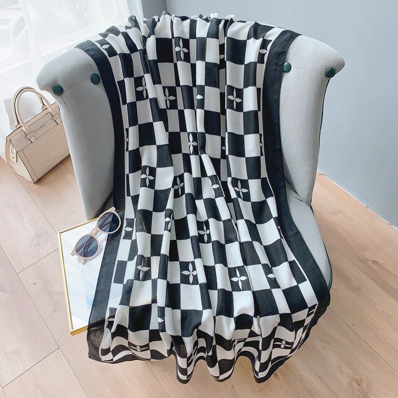 CrossKulture - MonochromeMatrix Viscose Cotton Scarf Black flared on sofa view