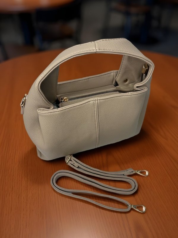 CrossKulture - BlissArt lightweight beige handbag side view showing long strap