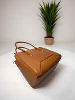 CrossKulture - BlissMuse lightweight tan handbag placed on a table