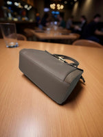 CrossKulture - BlissVibe lightweight grey handbag placed on a table