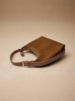 CrossKulture - BlissLuxe lightweight brown handbag placed on a table