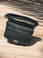 CrossKulture - BlissPulse black handbag interior with zip compartment and storage pockets