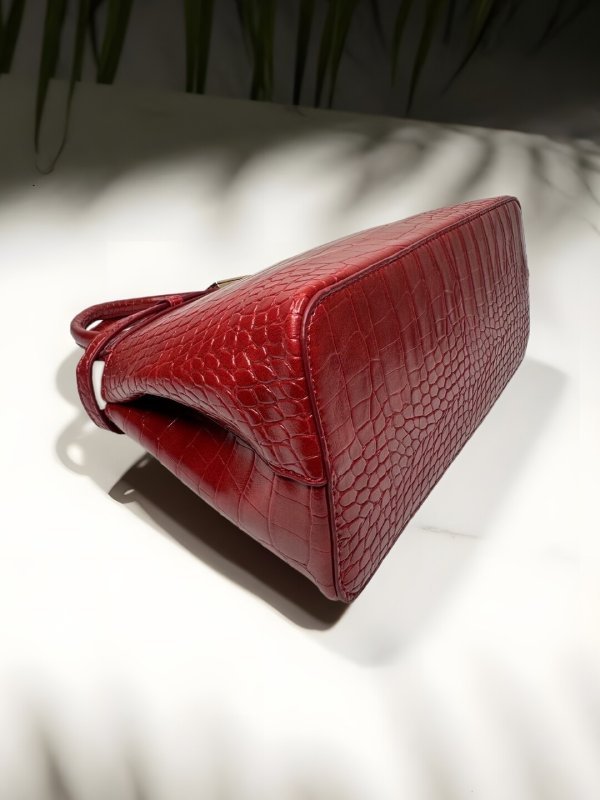 CrossKulture - BlissMode lightweight red handbag placed on a table