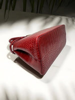 CrossKulture - BlissMode lightweight red handbag placed on a table