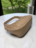 CrossKulture - BlissPoise lightweight beige handbag placed on a table