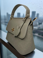 CrossKulture - BlissClass green handbag with textured design, side view