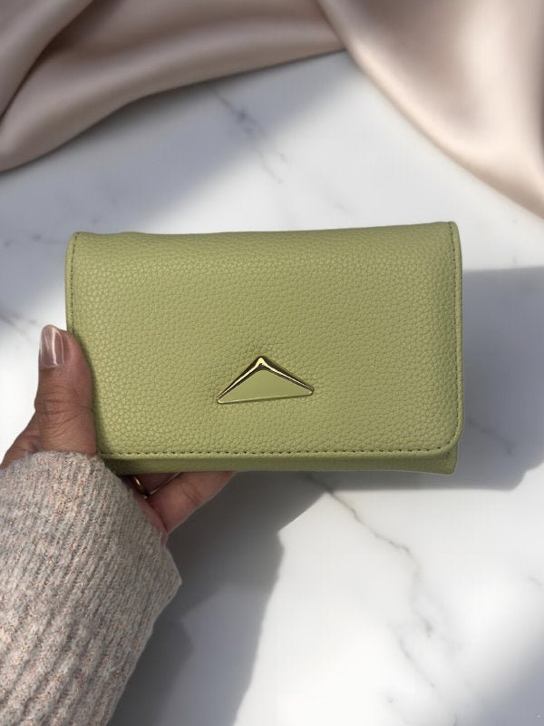 CrossKulture - JadeClutch lightweight clutch bag front view in model hands