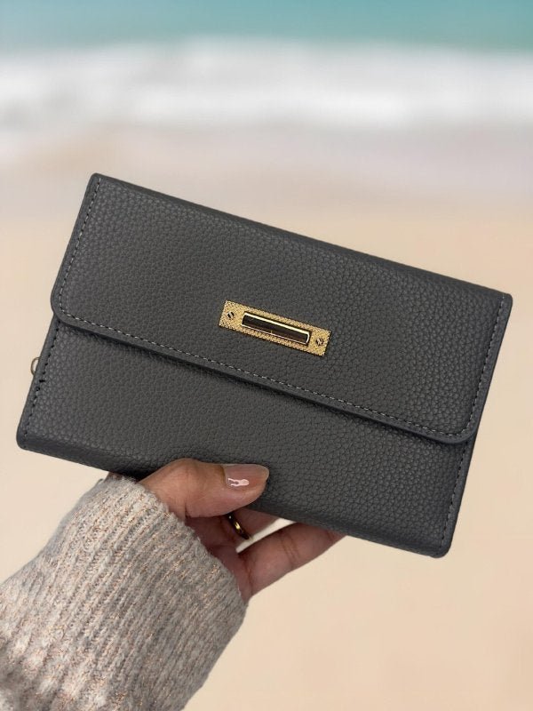 CrossKulture - SlateClutch lightweight clutch bag front view in model hands