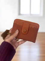 CrossKulture - PrimeCrush lightweight small wallet front view in hands