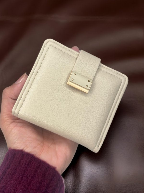 CrossKulture - TinyCrush lightweight small wallet front view in hand